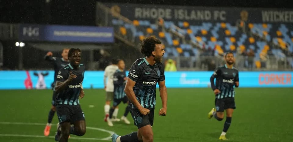 Rhode Island FC players celebrating a goal