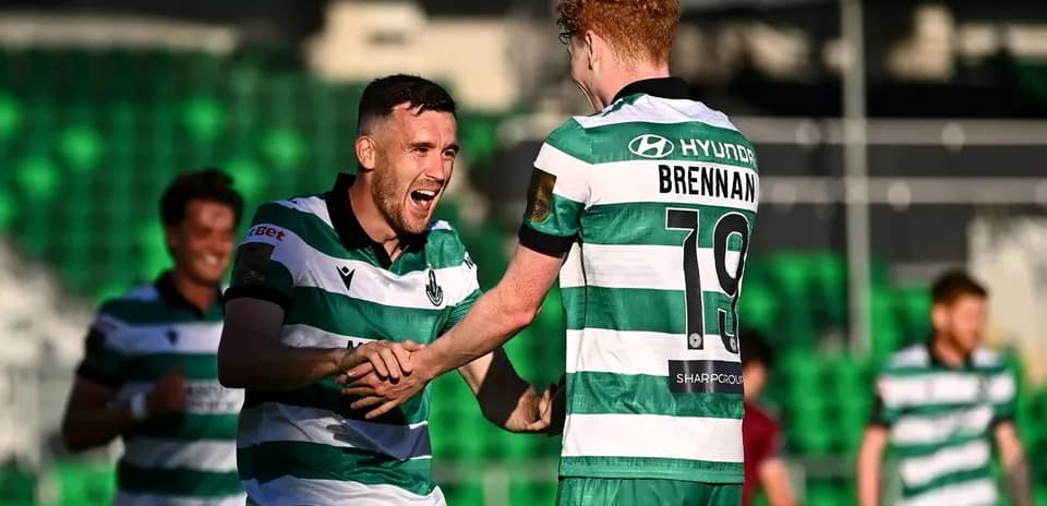 Players celebrating a goal during a match