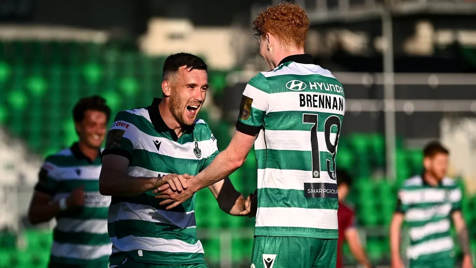 Players celebrating a goal during a match