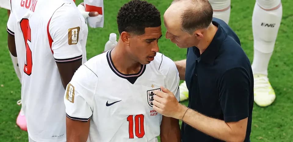 Player receiving advice from coach during match