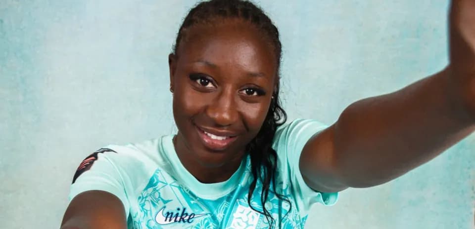 Athlete posing for a selfie in team jersey