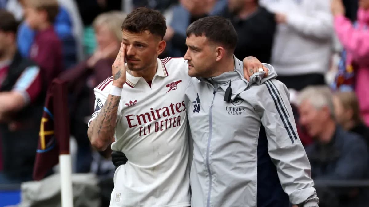 Player receiving support from staff after match