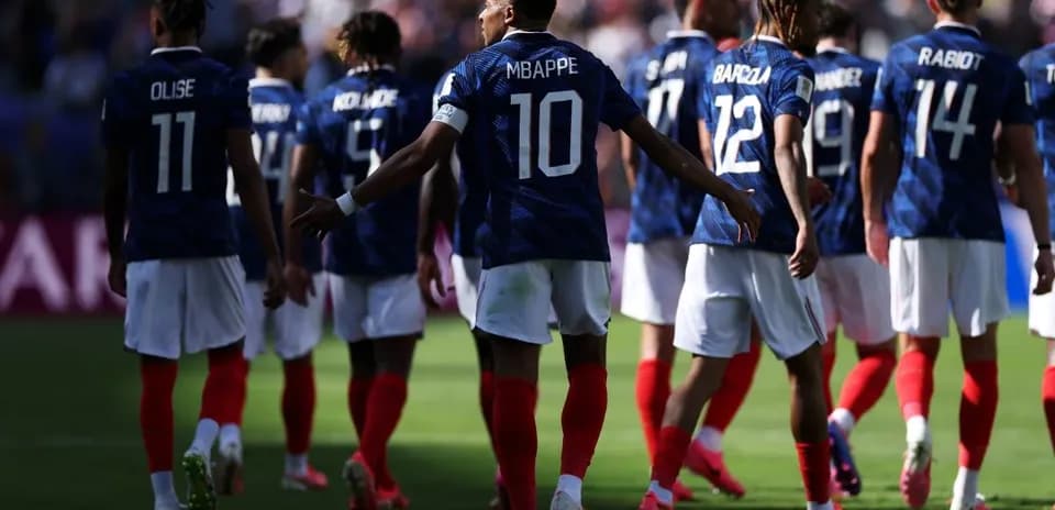 French team walking on field during match