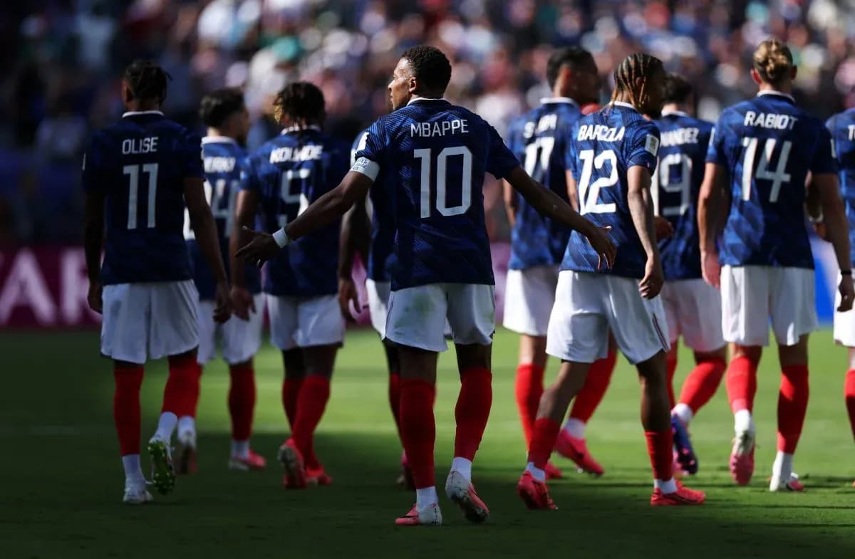 French team walking on field during match