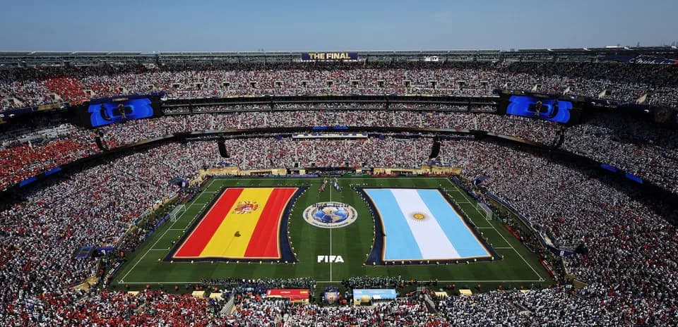 Spain and Argentina flags displayed on field
