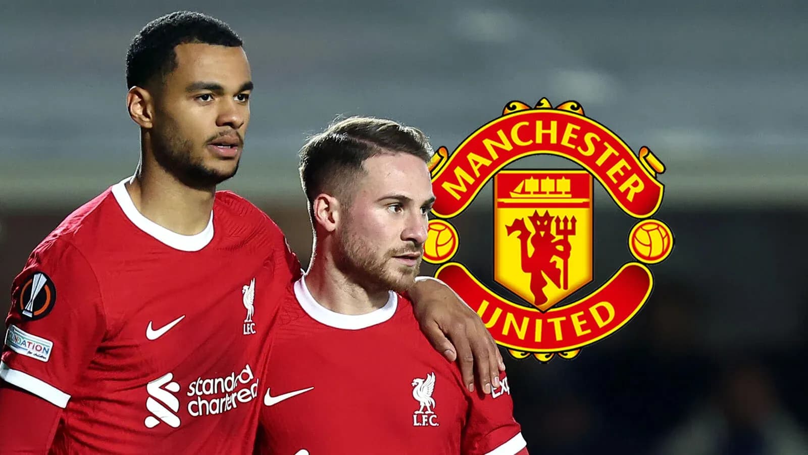 Two players in red Liverpool jerseys on field