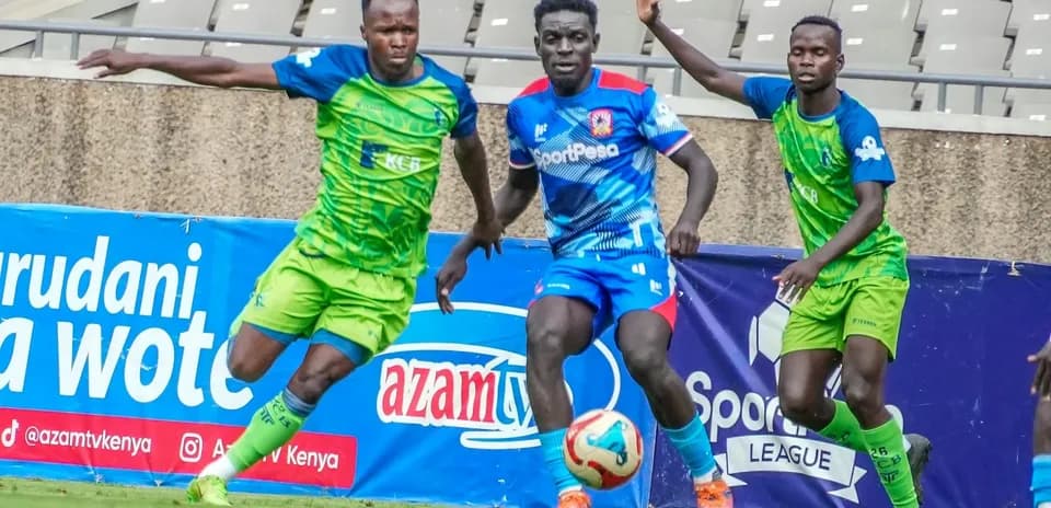Players competing for the ball during FKF Premier League match