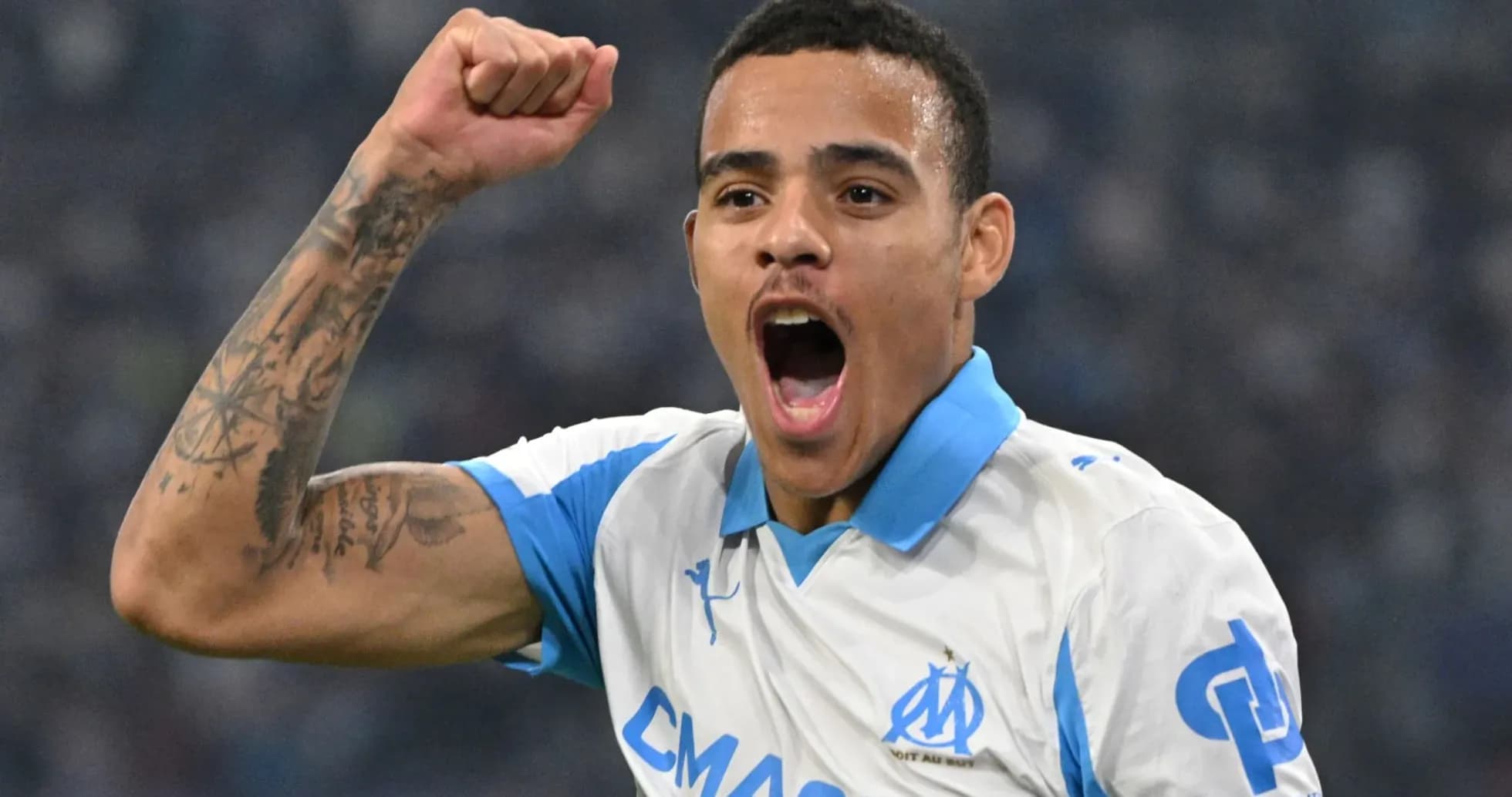 Player celebrating a goal in Marseille jersey