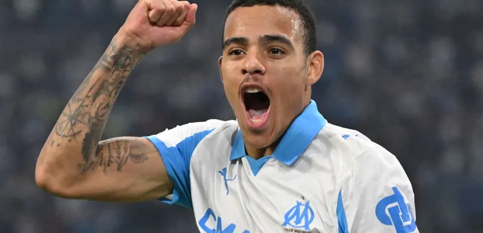 Player celebrating a goal in Marseille jersey