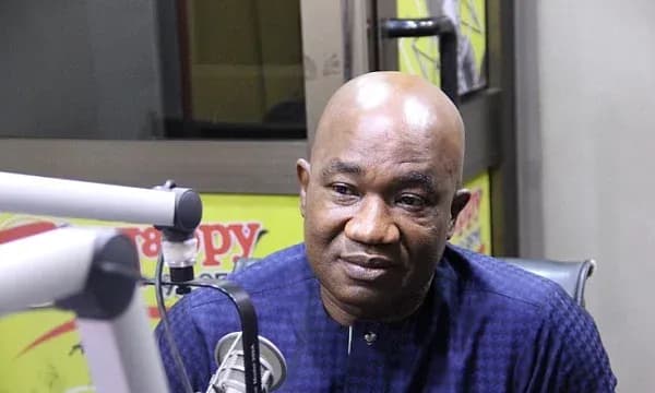 Man speaking during radio interview in studio