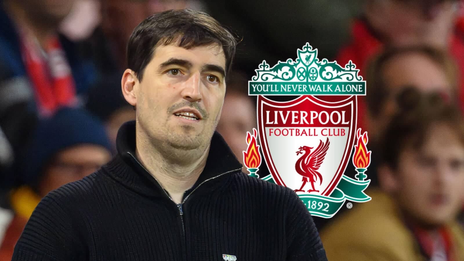 Person standing in front of Liverpool FC logo