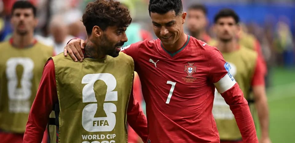 Two players conversing during FIFA World Cup match