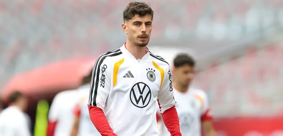 Player in Germany training kit on the pitch
