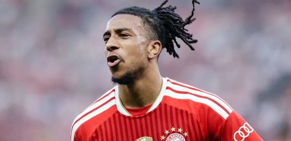 Player celebrating during match in Bayern Munich jersey