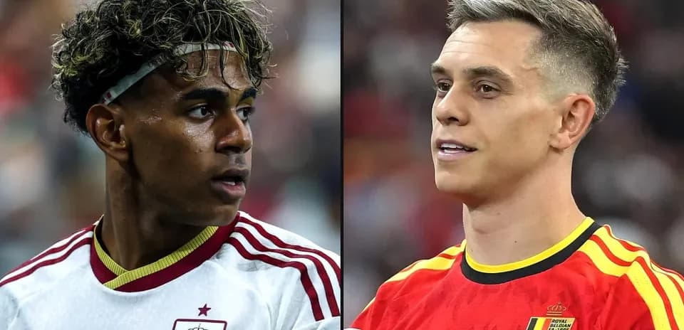 Two football players from Spain and Belgium in jerseys