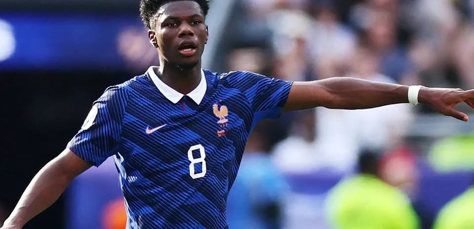 Player gesturing during a football match for France