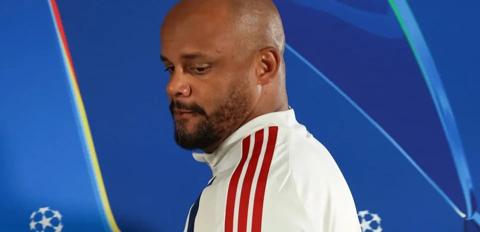Person standing before a Champions League backdrop
