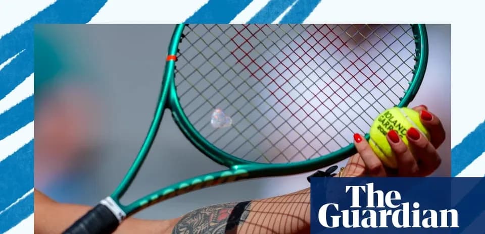 Player holding tennis racket and ball during match