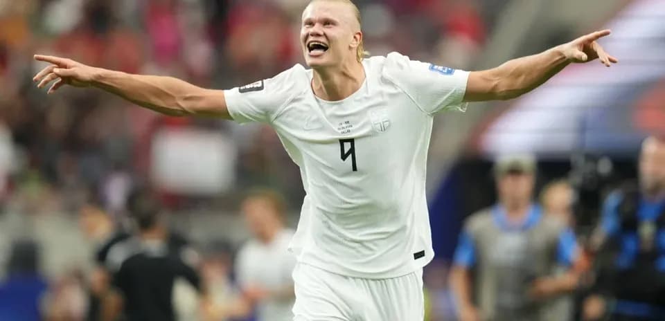 Player celebrating a goal on the field
