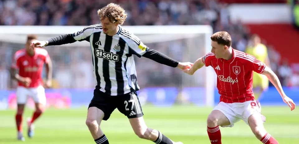 Player competing for the ball during Nottingham Forest match