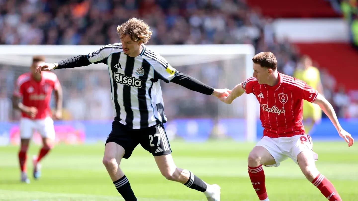 Player competing for the ball during Nottingham Forest match