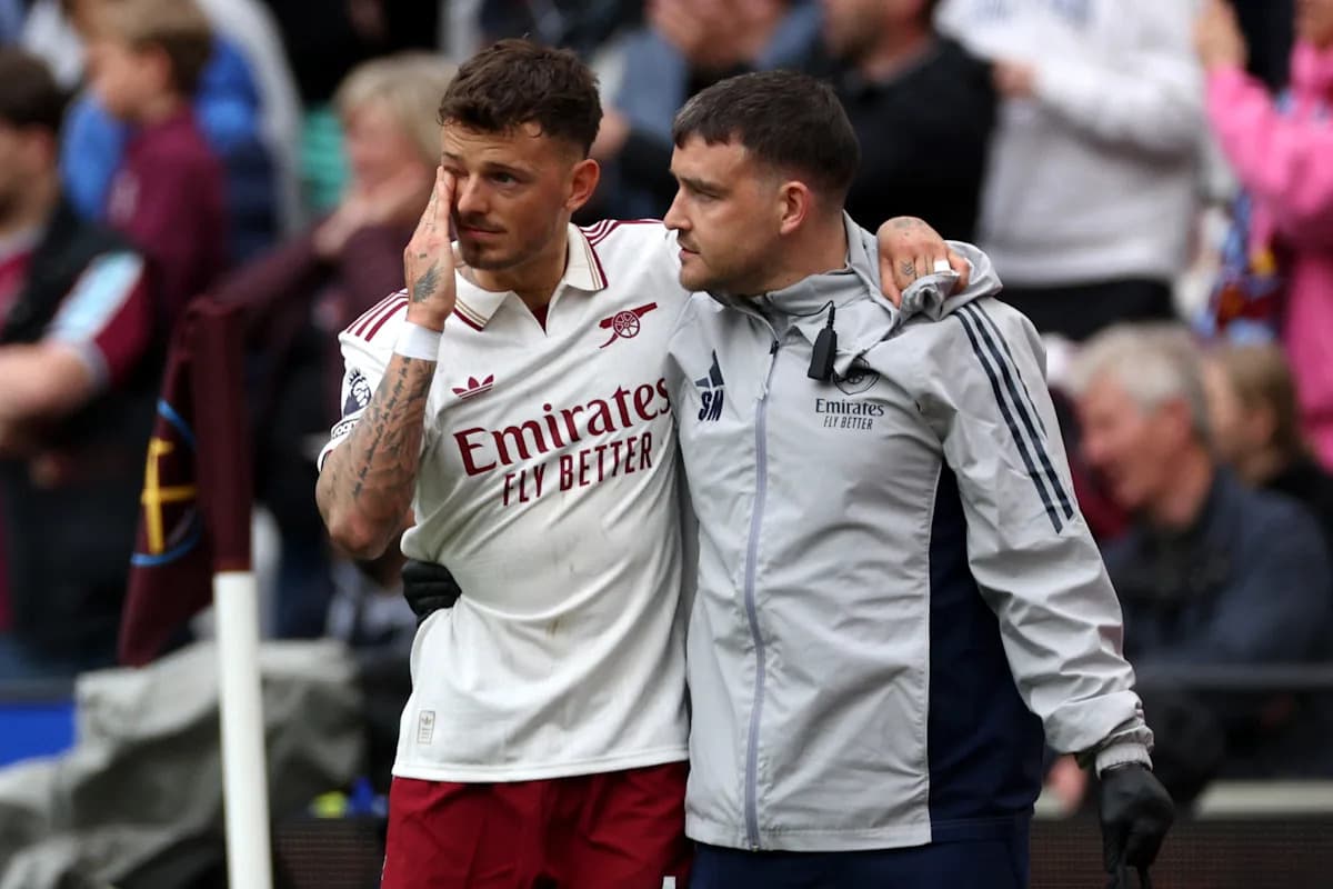 Player receiving support from staff after match