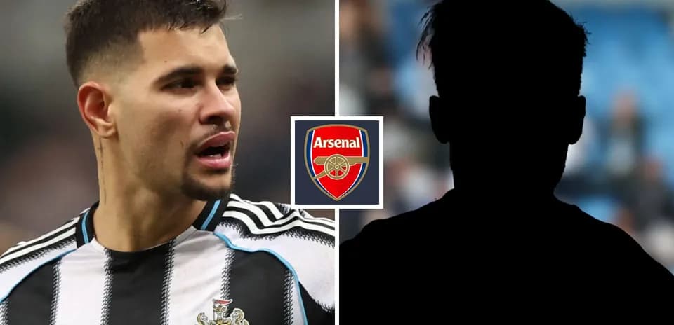 Newcastle player speaking with Arsenal logo in background
