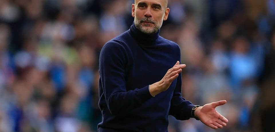 Coach gesturing on the sideline during match