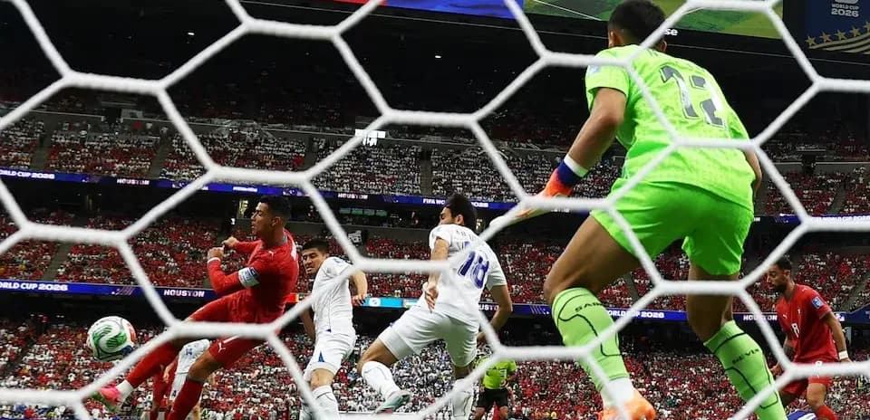 Player taking a shot on goal during match