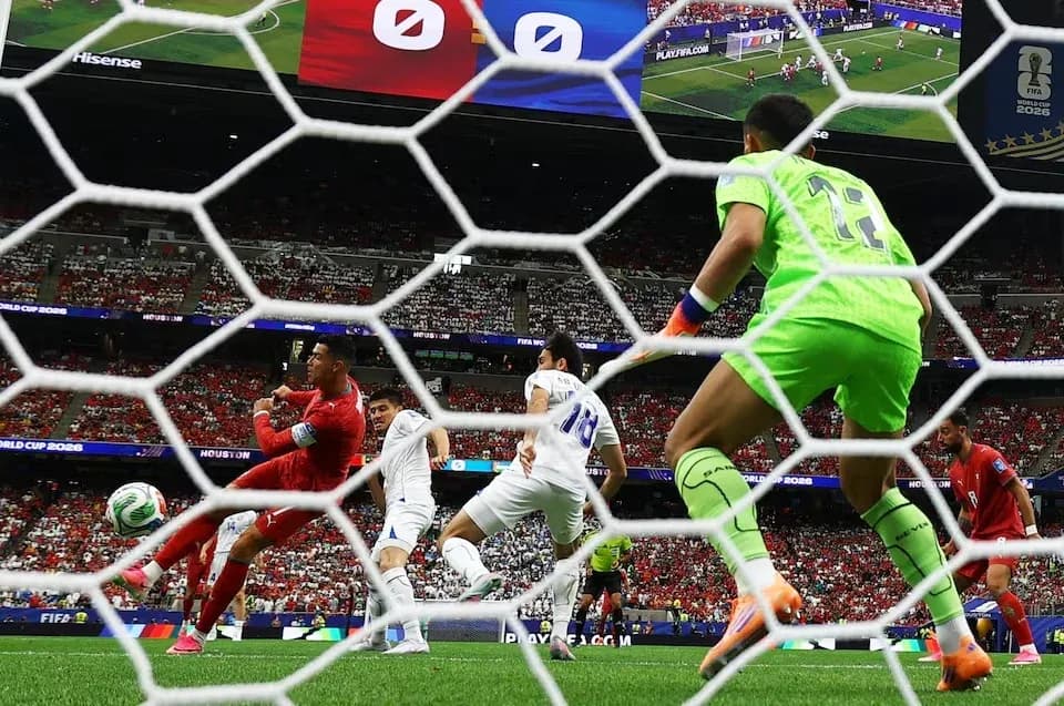 Player taking a shot on goal during match