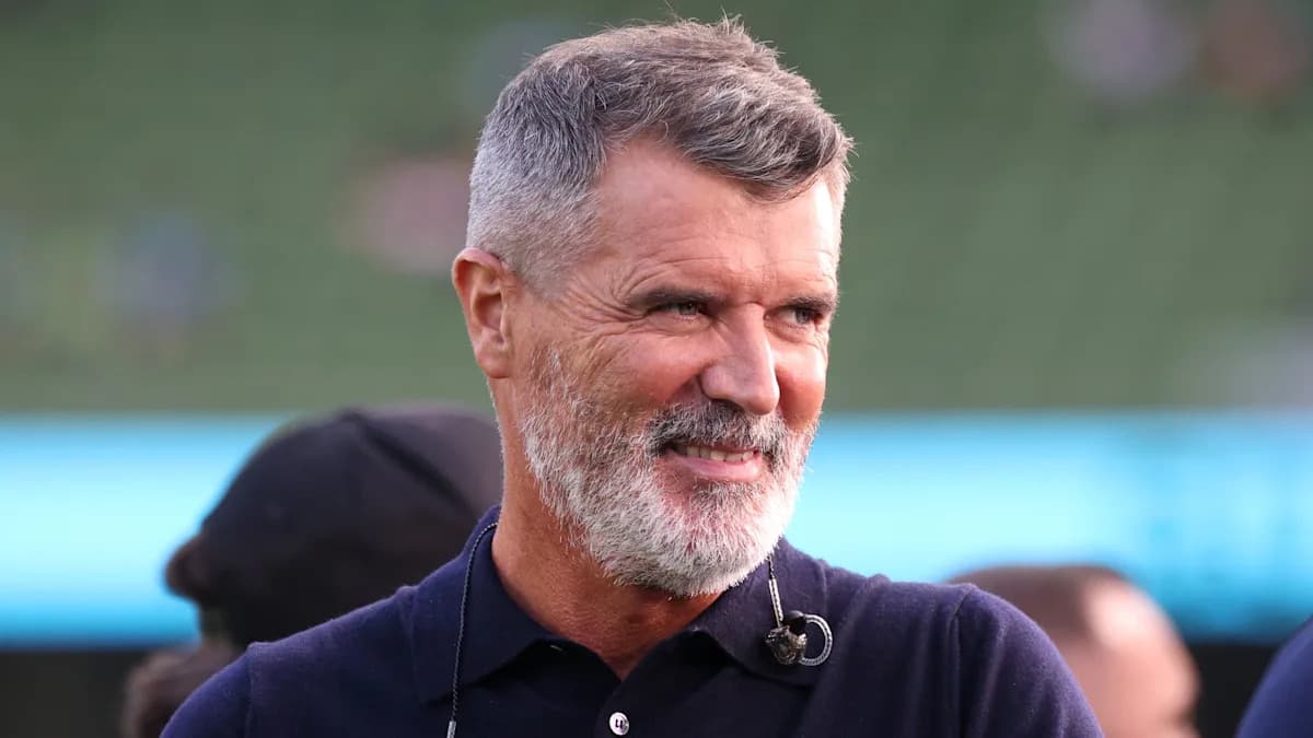Man with gray beard smiling at event