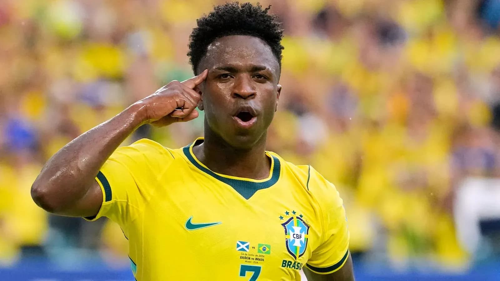 Player celebrating with a salute gesture during match