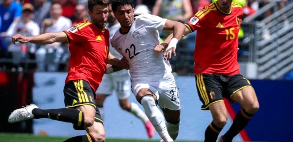 Players competing for the ball during match action