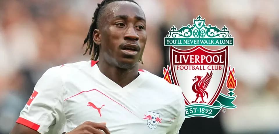 Player running on field with Liverpool logo background