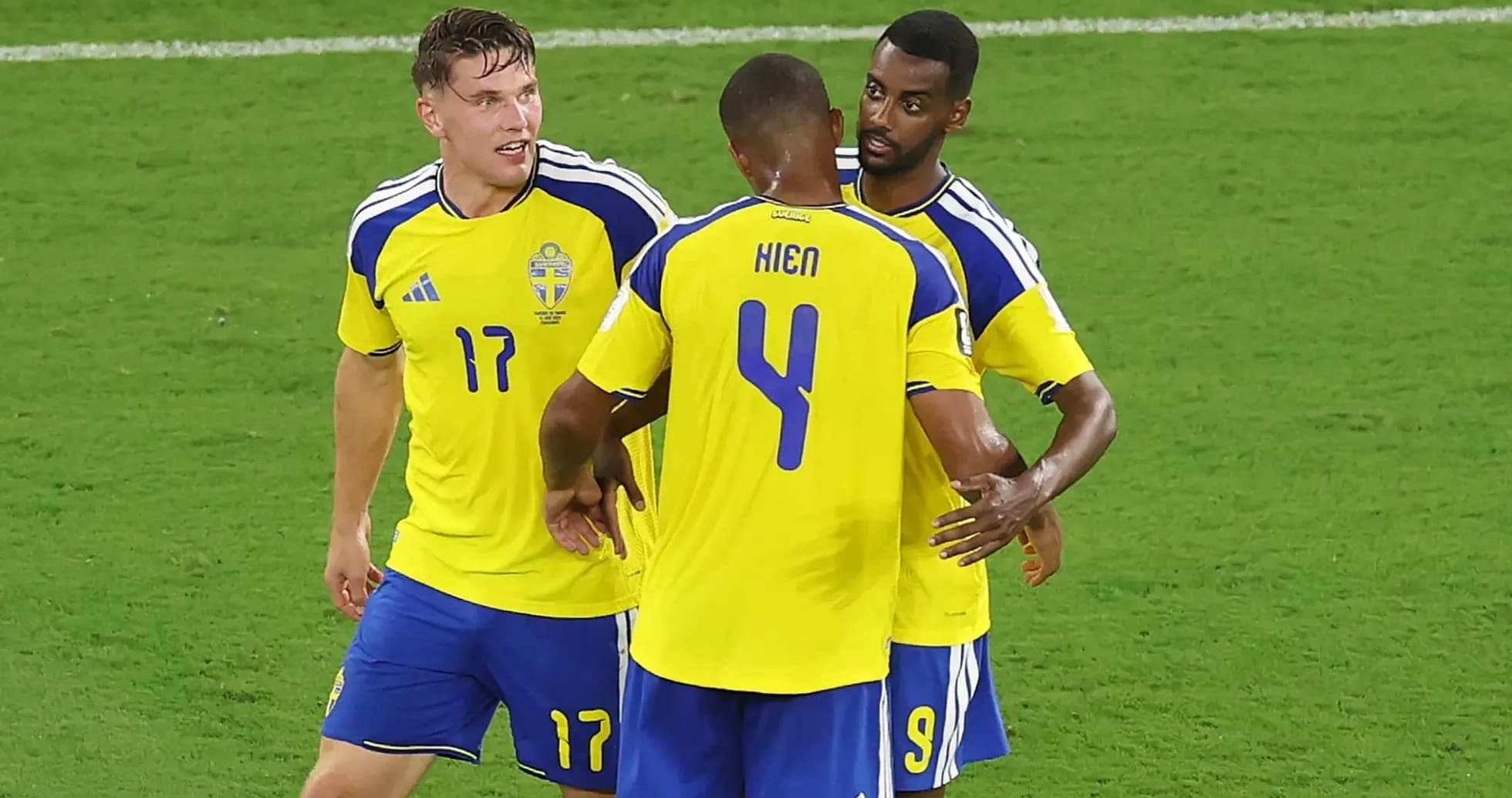 Swedish players celebrating on the field during match