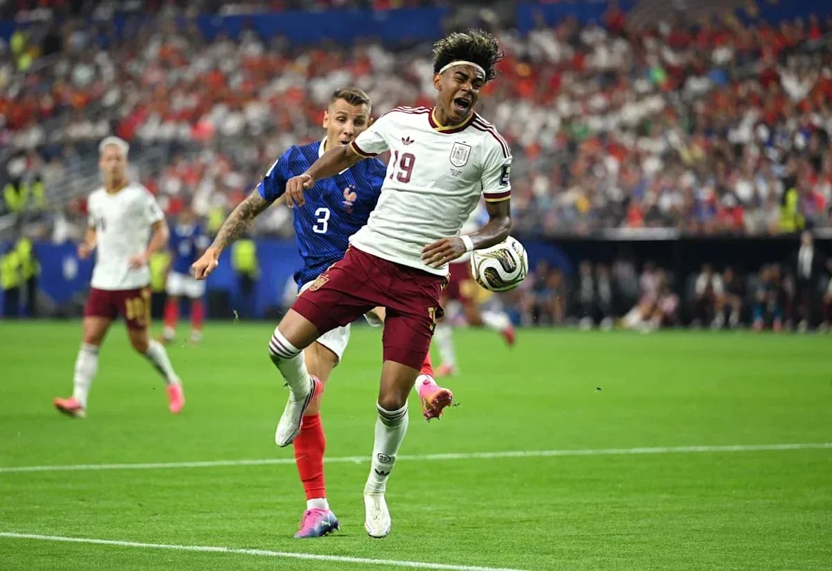 Player from Spain evading tackle during match