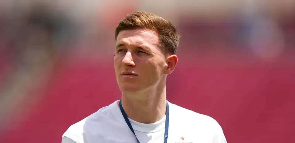 Player wearing England shirt during warm-up