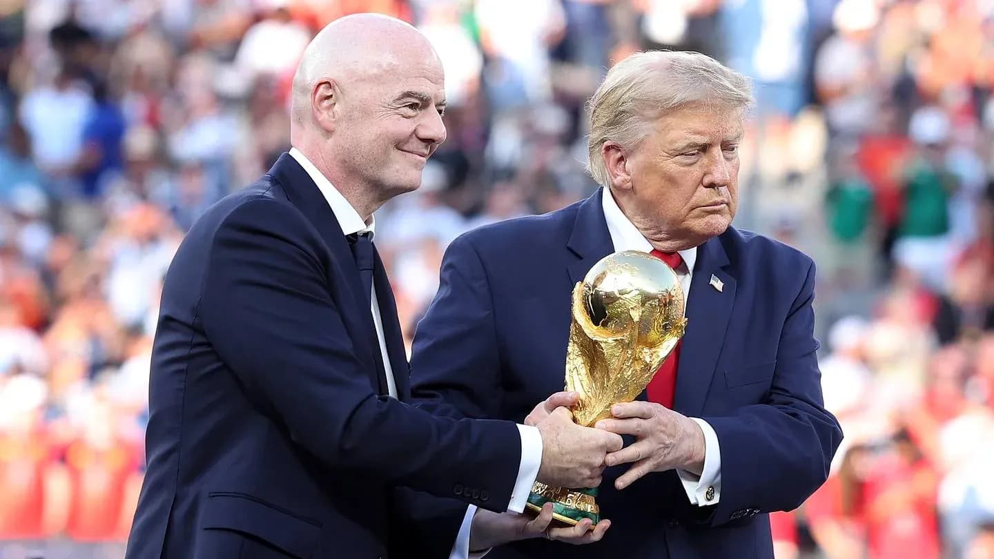 Gianni Infantino handing FIFA World Cup trophy to Donald Trump