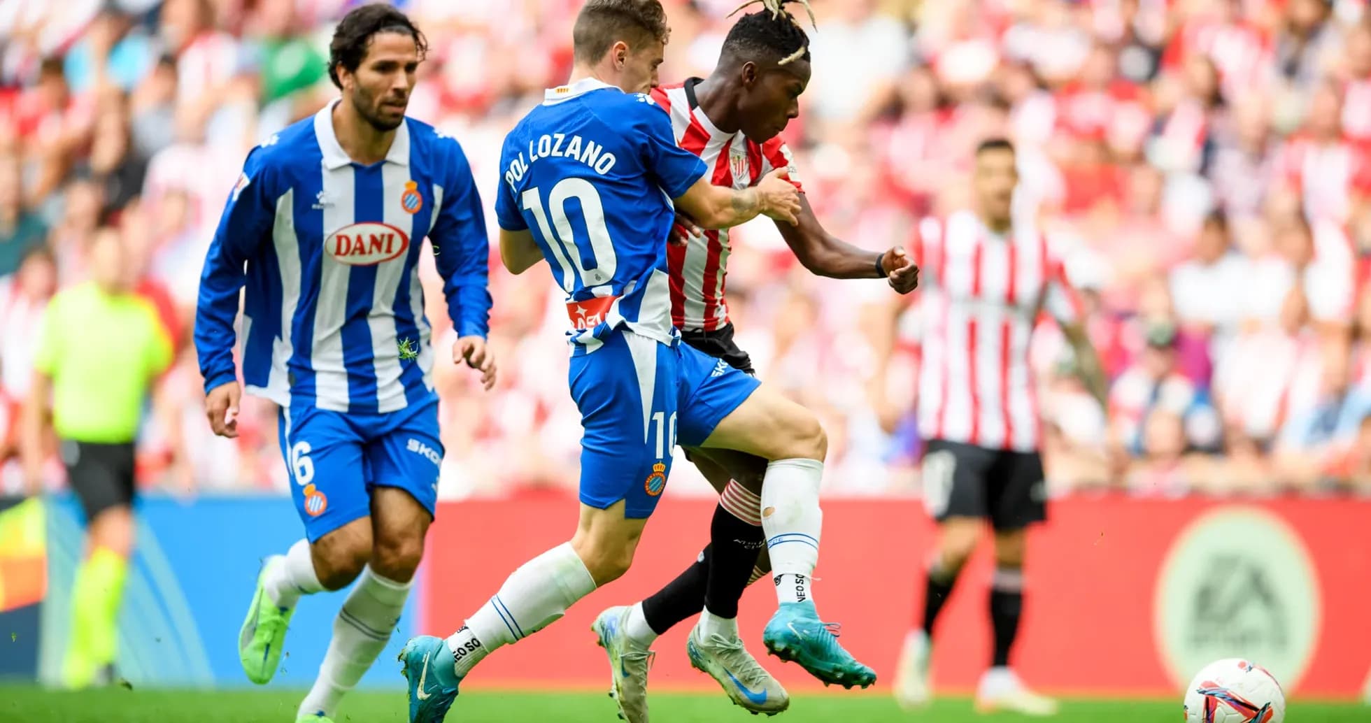 Pol Lozano tackling opponent during Espanyol match