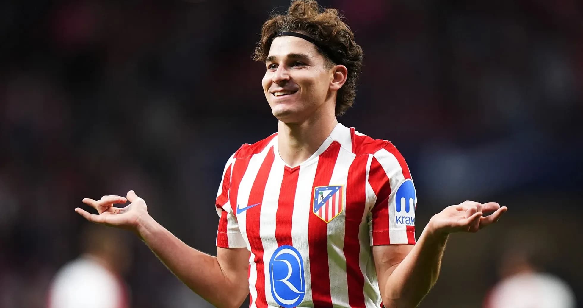 Atletico Madrid player celebrating on the field