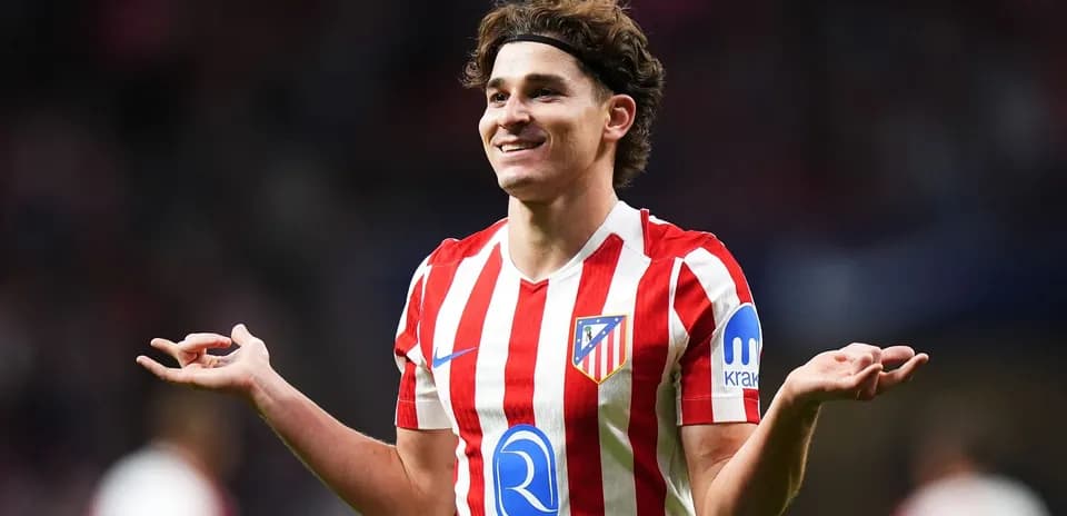 Atletico Madrid player celebrating on the field