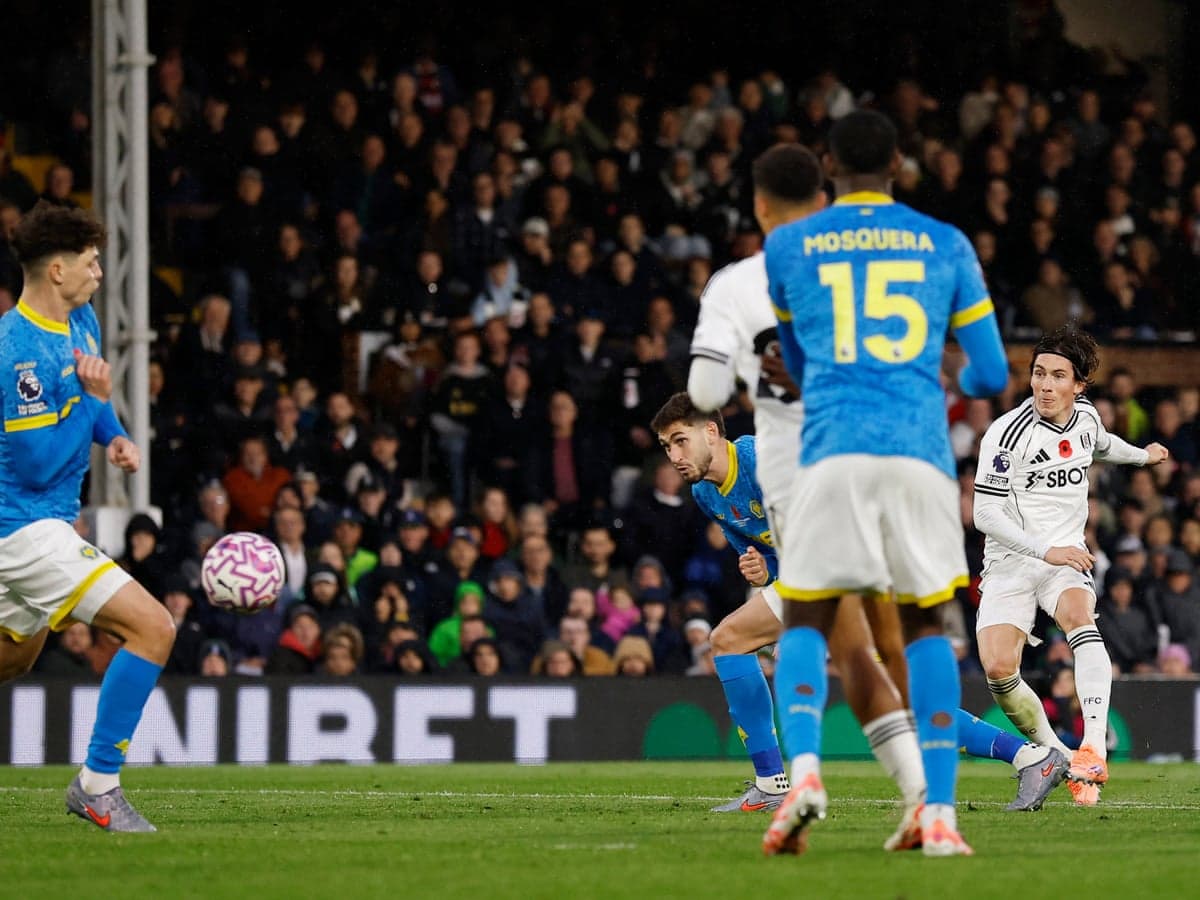 Fulham player shooting during Wolves match