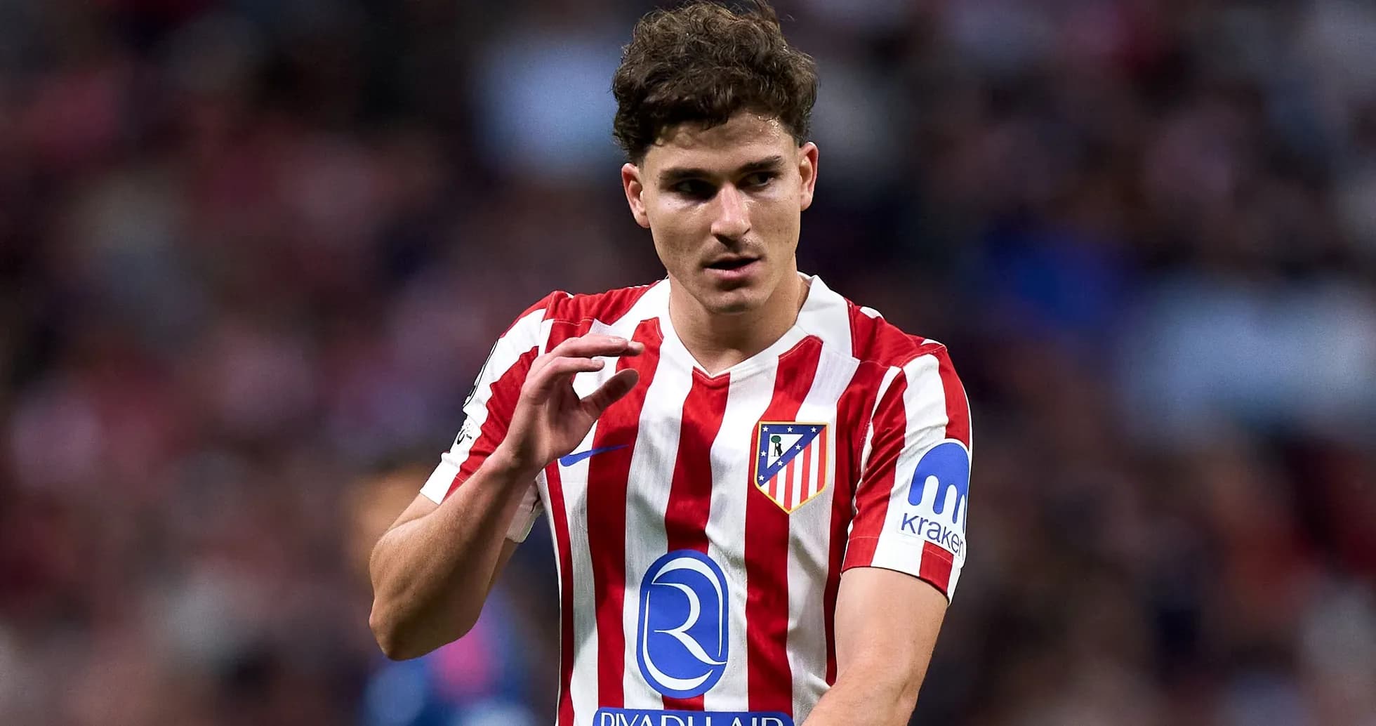 Player gesturing during match for Atlético Madrid