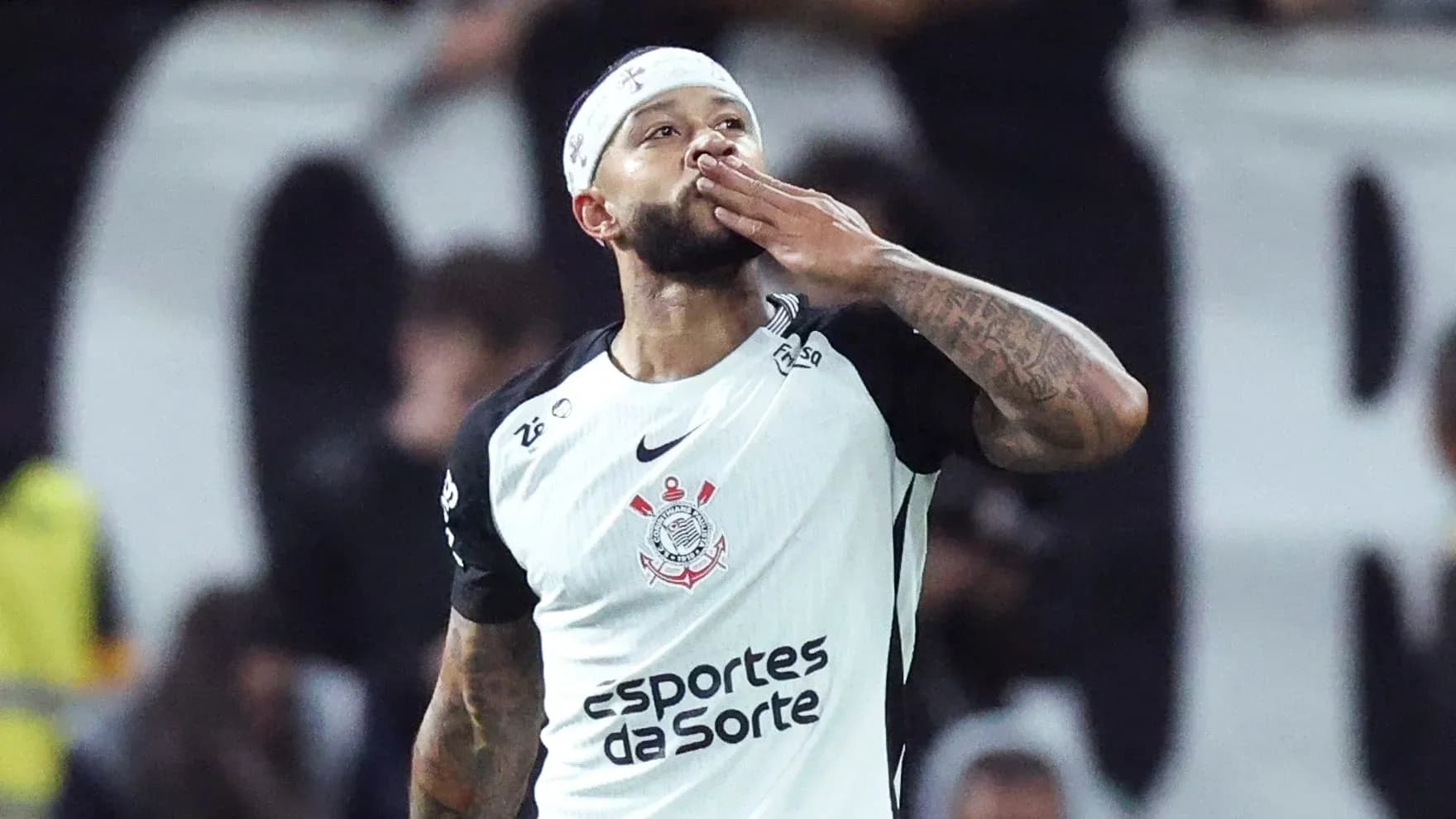 Player celebrating by blowing a kiss after scoring