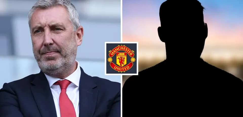 Manager in suit with Manchester United logo background