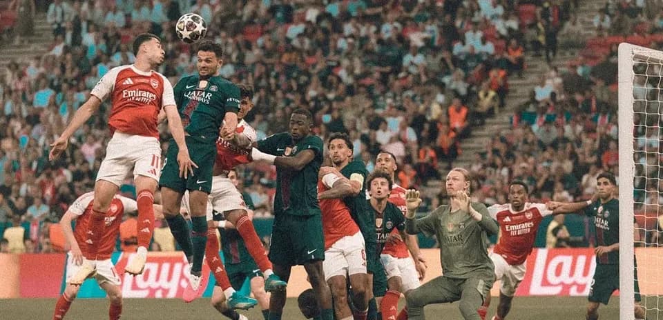 Players contesting for the ball during corner kick