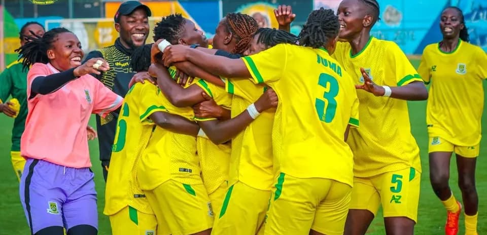 Players celebrating a goal during match