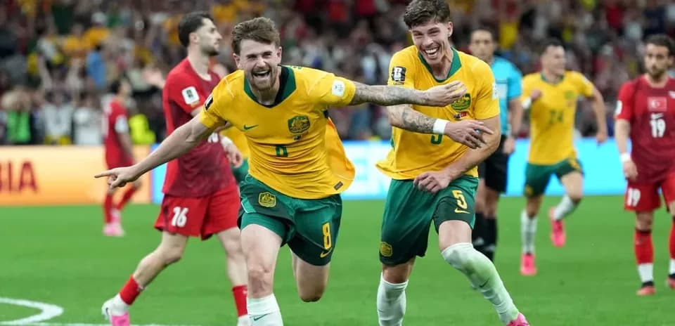 Australia players celebrating a goal against Türkiye