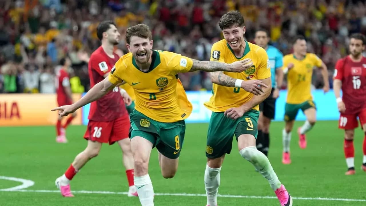 Australia players celebrating a goal against Türkiye