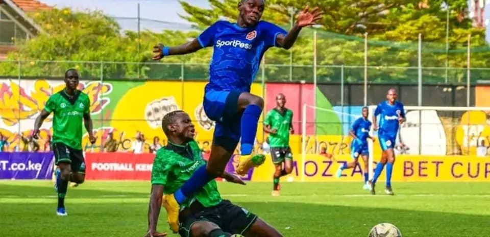 Player from Murang'a SEAL tackling Mara Sugar player